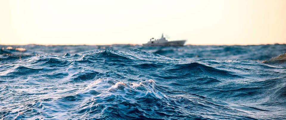 Navy vessel on sea.