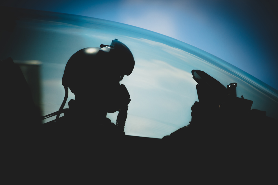 Pilot in a cockpit.