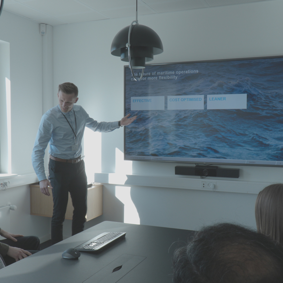 People in a meeting room.