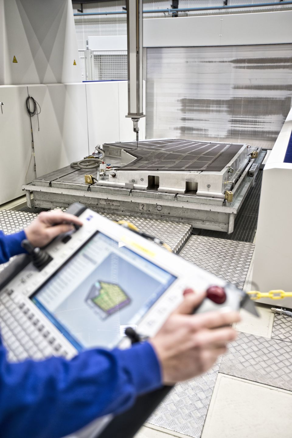 Terma employee working on aerostructures manufacturing at Grenaa production facility.