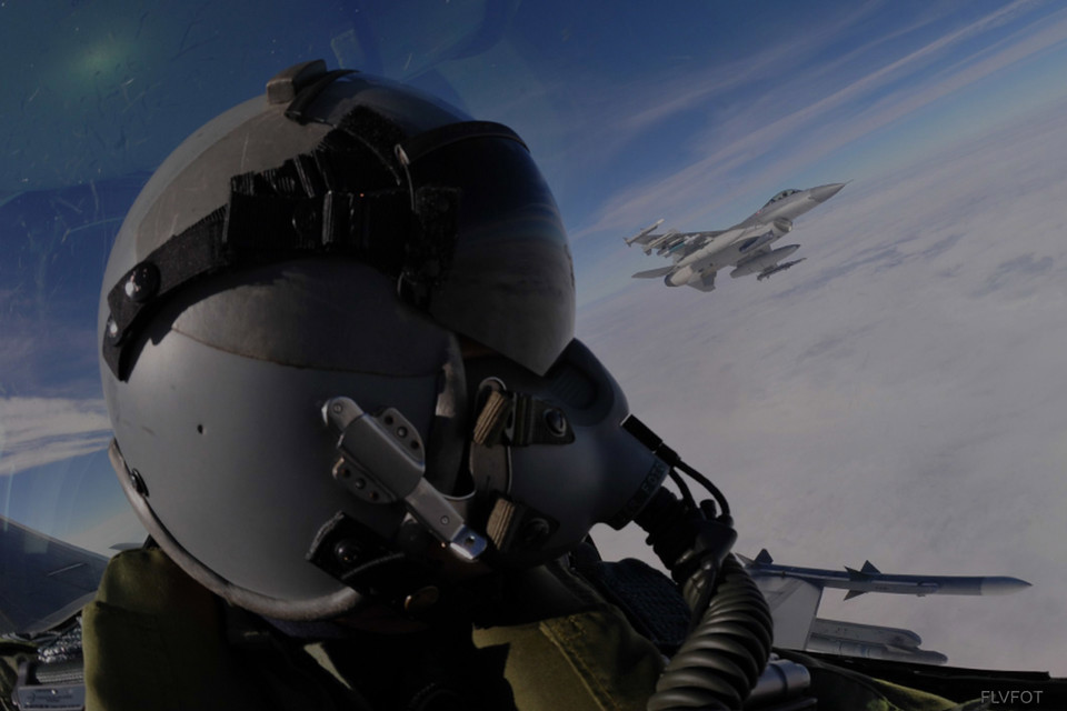 Headshot of pilot in cockpit.