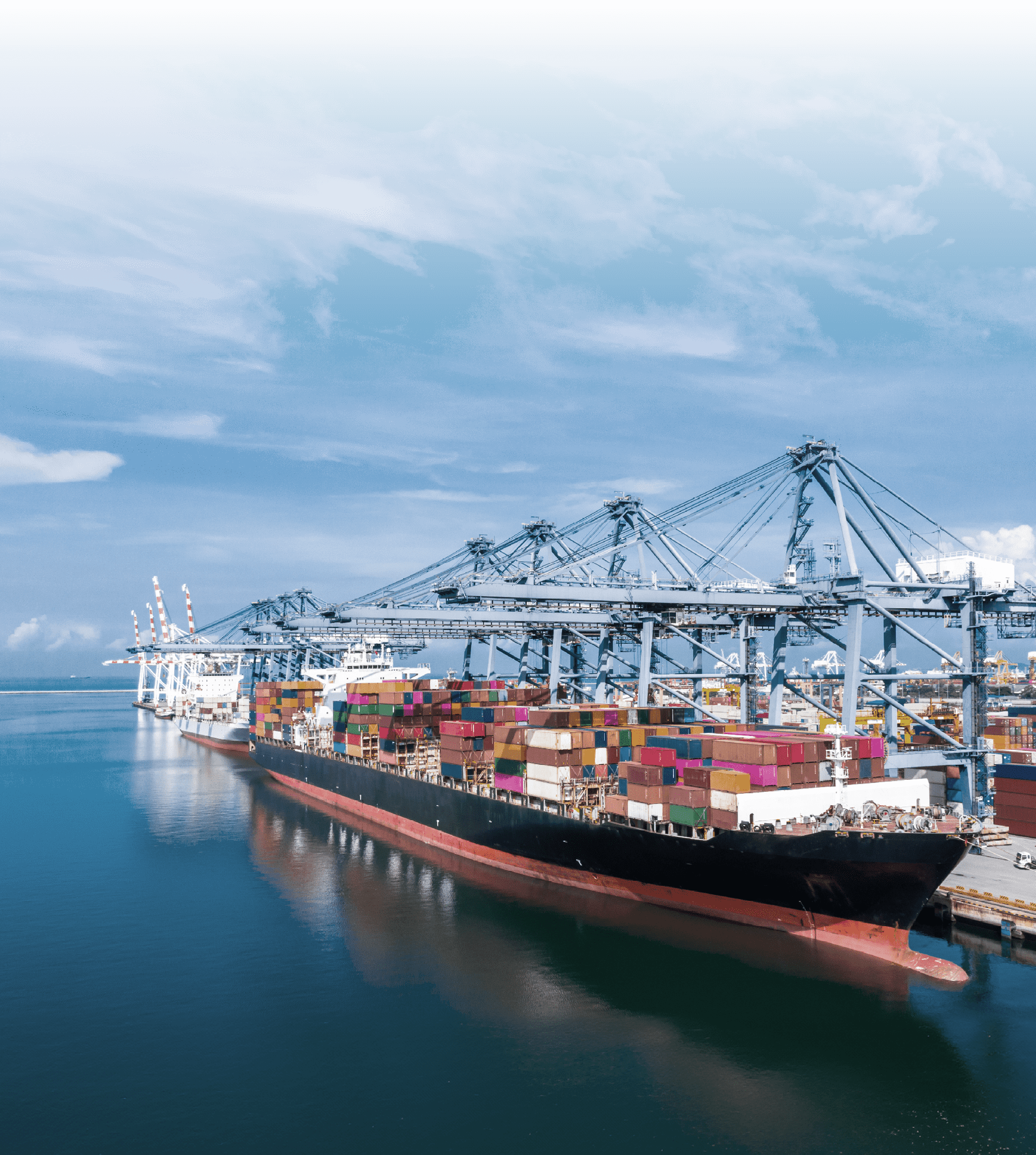 Container ship at industrial port in import export business logistic and transportation of international by container ship in the sea, Container loading in cargo freight ship with industrial crane.; Shutterstock ID 1570847962; purchase_order: -; job: anniversaries; client: Terma/BEPH; other: 