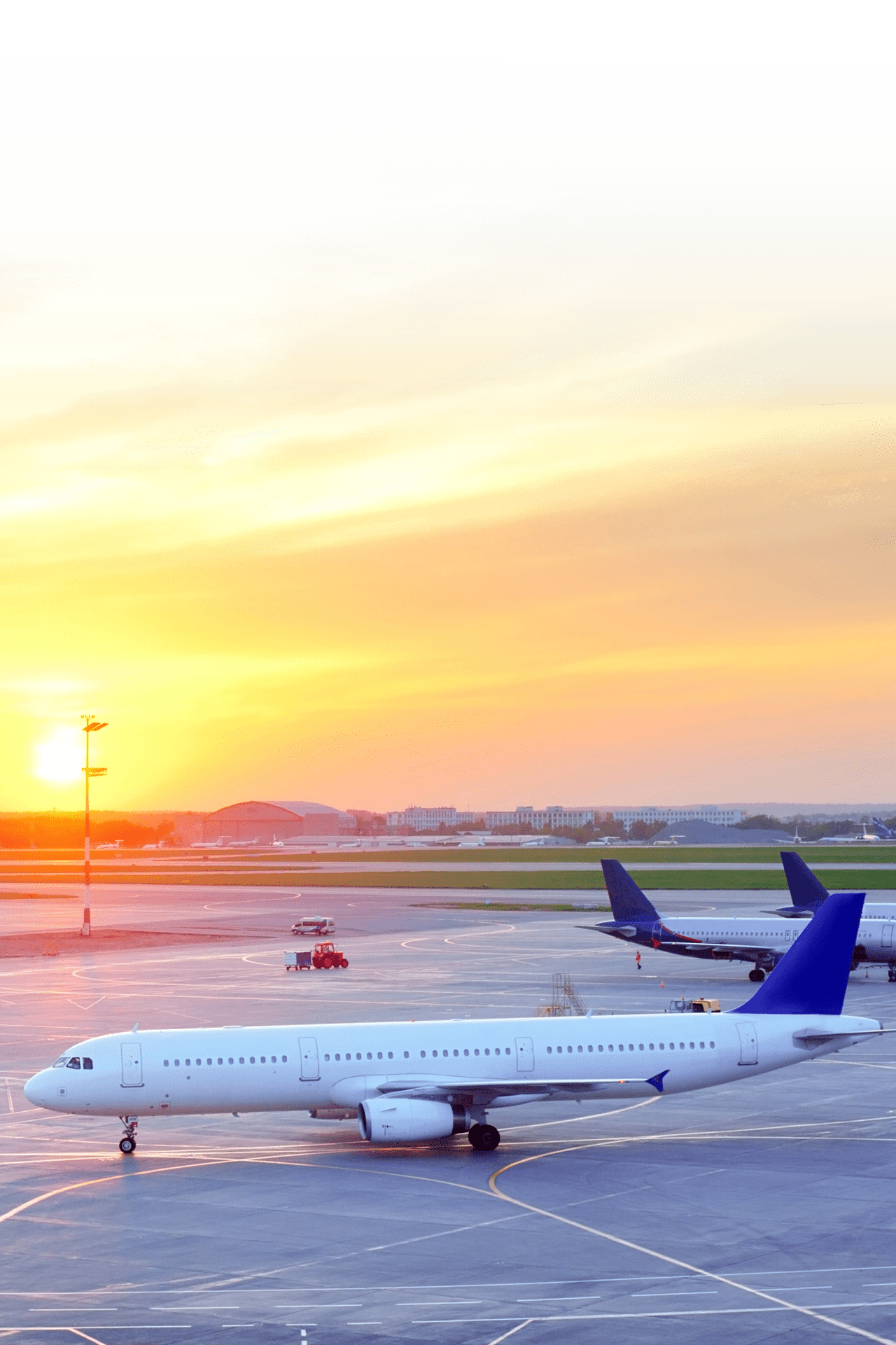 View of Airplanes at airport in the beautiful sunset